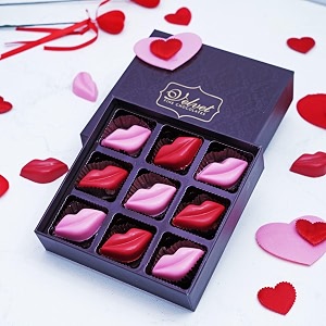 velvet fine chocolates sweet kisses gift box  assorted chocolates  perfect valentines gift  elegant packaging  handcrafted treats  pack of 11 kg